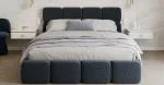 Čalúnená posteľ DELICATO 140x200 cm Modrá Boucle s úložným priestorom kovový rošt