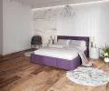 Čalúnená posteľ AMBER 180x200 Fialová Trinity s úložným priestorom a kovovým roštom
