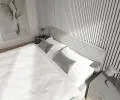 Čalúnená posteľ CARO 160x200 s kovovým zdvižným roštom SIVÁ