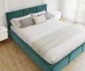 Čalúnená posteľ FRESIA 140x200 s kovovým zdvižným roštom TYRKYSOVÁ