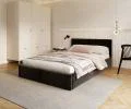 Čalúnená posteľ AMBER 90x200 Čierna Trinity s úložným priestorom a dreveným roštom