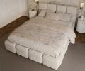 Čalúnená posteľ DELICATO 140x200 cm Krémová Boucle s úložným priestorom kovový rošt