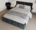 Čalúnená posteľ DELICATO 160x200 cm Modrá Boucle s úložným priestorom kovový rošt