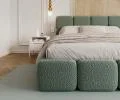Čalúnená posteľ DELICATO 140x200 cm Tyrkysová Boucle s úložným priestorom kovový rošt